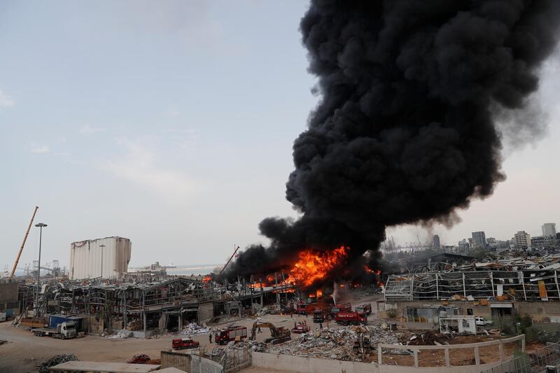 Fire burns in the port in Beirut. AP Photo