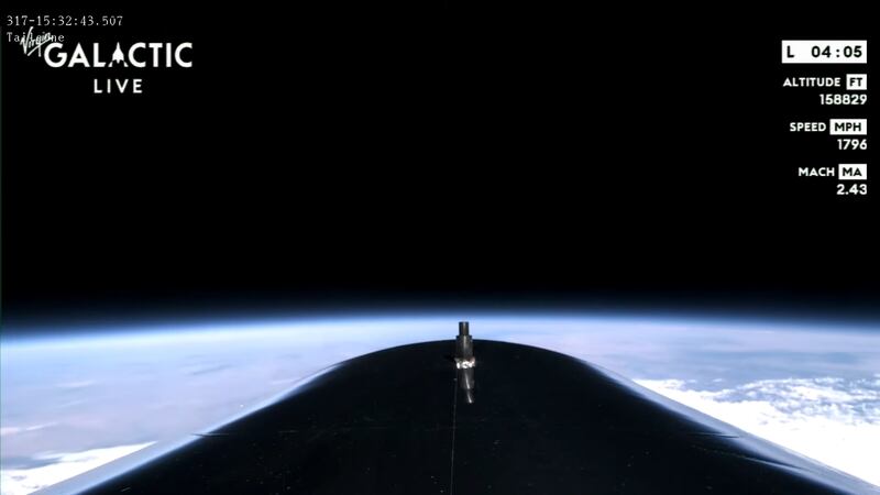 A stunning view of Earth against the darkness of space from a camera aboard the Virgin Galactic spaceplane.
