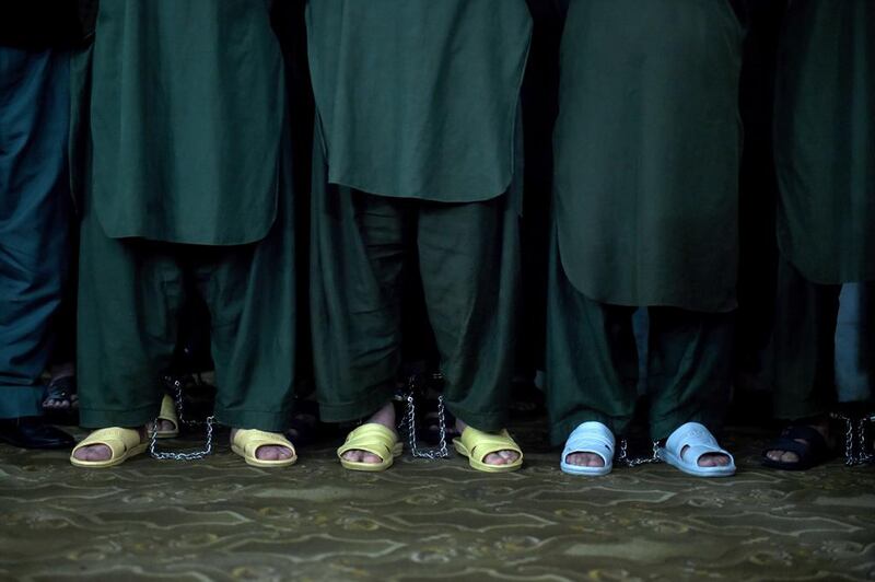 On Tuesday, 11 police officers were sentenced to a year in prison for or failing to protect a woman who was lynched by a mob in Kabul. Wakil Kohsar / AFP