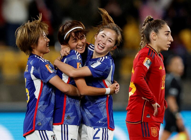 Hinata Miyazawa, second left, celebrates scoring Japan's third goal against Spain with Risa Shimizu and Honoka Hayashi. Reuters