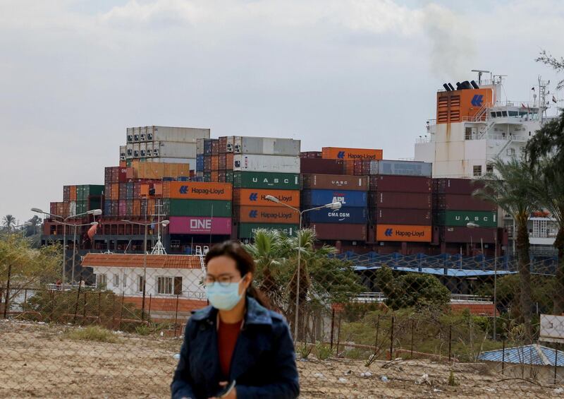 A ship is seen after sailing through Suez Canal as traffic resumes after a container ship that blocked the waterway was refloated, in Ismailia. Reuters