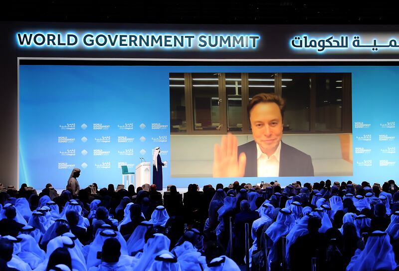Elon Musk and Mohammad Al Gergawi, Minister of Cabinet Affairs, speak on day three of the World Government Summit in Dubai. Mr Al Gergawi is also chairman of the summit. Pawan Singh / The National