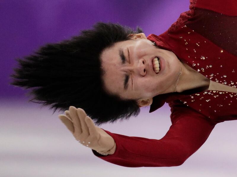 Cha Junhwan, of South Korea, performs during the men's short programme figure skating in the Gangneung Ice Arena at the 2018 Winter Olympics in Gangneung. Julie Jacobson / AP Photo