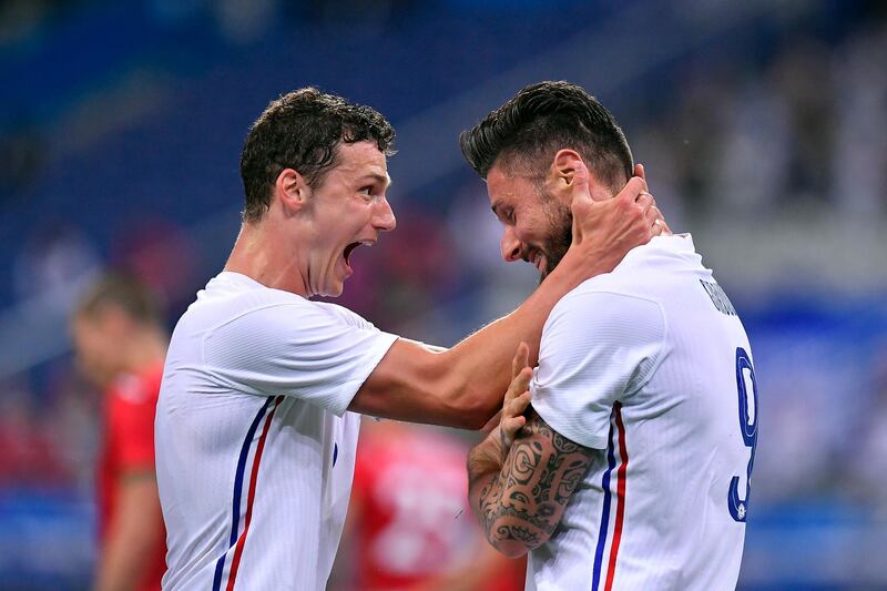 Olivier Giroud is congratulated by Benjamin Pavard after scoring for France against Bulgaria. Getty