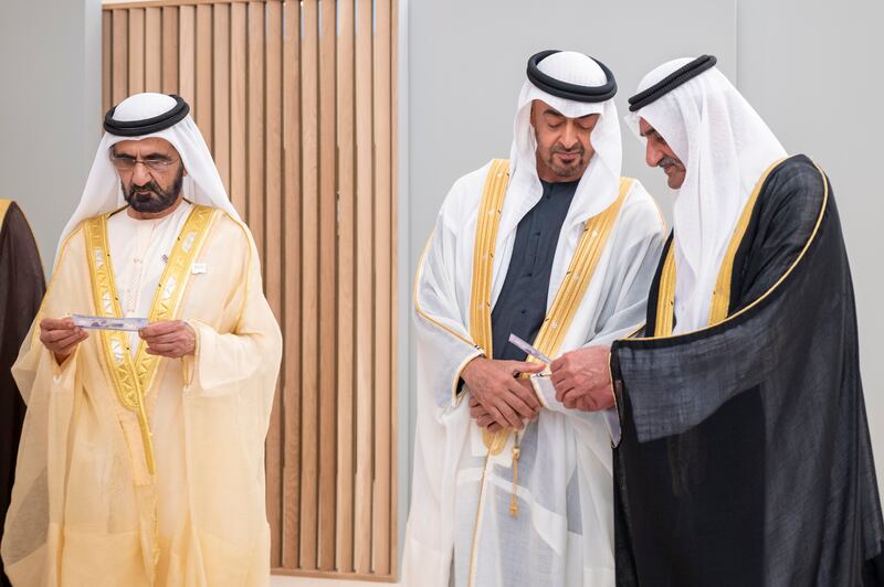 From left, Sheikh Mohammed bin Rashid, Sheikh Mohamed bin Zayed and Sheikh Hamad bin Mohammed Al Sharqi. Mohamed Al Hammadi / Ministry of Presidential Affairs