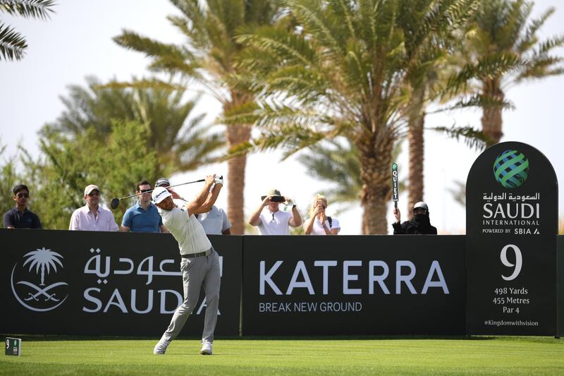 UNSPECIFIED, SAUDI ARABIA - FEBRUARY 01:  Dustin Johnson of The United States tees off on the eighth hole during Day two of the Saudi International at the Royal Greens Golf & Country Club on February 01, 2019 in King Abdullah Economic City, Saudi Arabia. (Photo by Ross Kinnaird/Getty Images)