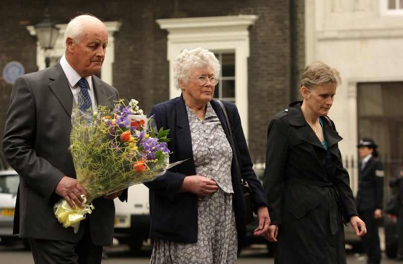Tim and Queenie Fletcher lay flowers at a ceremony to mark the 25th anniversary of the killing of Ms Fletcher, in 2009