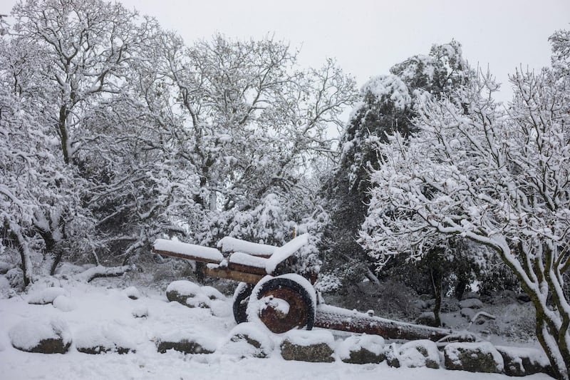 An old mobile artillery piece sits covered with snow in a memorial site near the Quneitra border crossing between Syria and the Israeli-controlled Golan Heights. AP