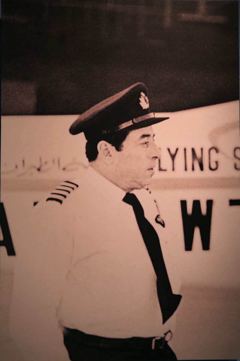 Capt Al Deeb in front of an aircraft at the school.