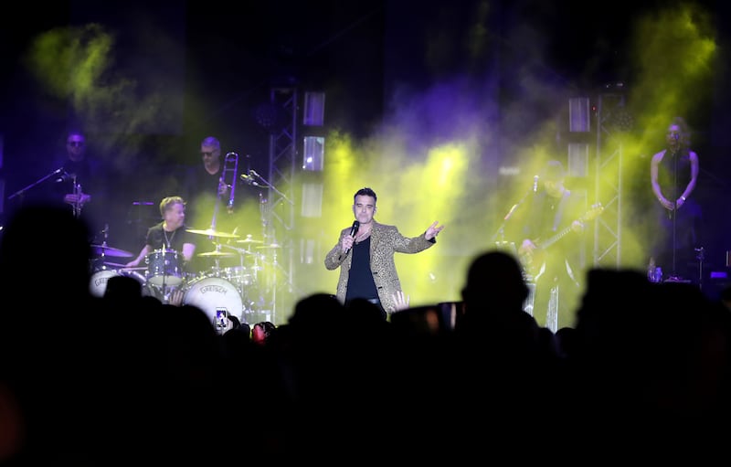 Robbie Williams performs at a New Year's Eve gala dinner at Atlantis, The Palm, in Dubai. All photos: Chris Whiteoak / The National