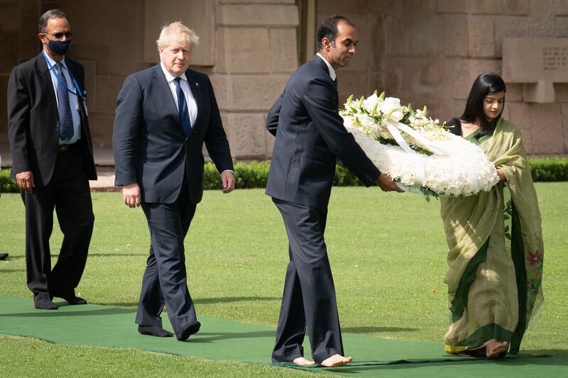 Boris Johnson visits Mahatma Gandhi's memorial at Raj Ghat in New Delhi. Getty Images