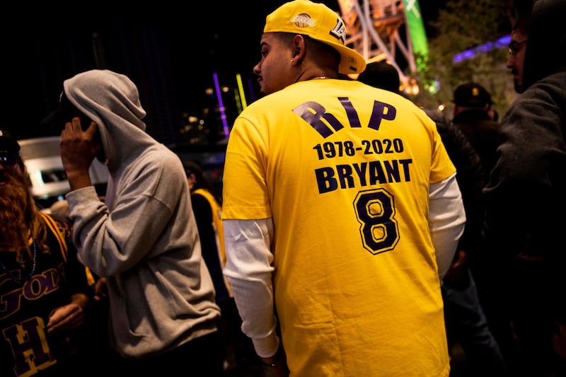 Fans of late Los Angeles Lakers guard Kobe Bryant gather at the LA Live entertainment complex across the street from the Staples Center, home of the Los Angeles Lakers, in Los Angeles, California.  EPA