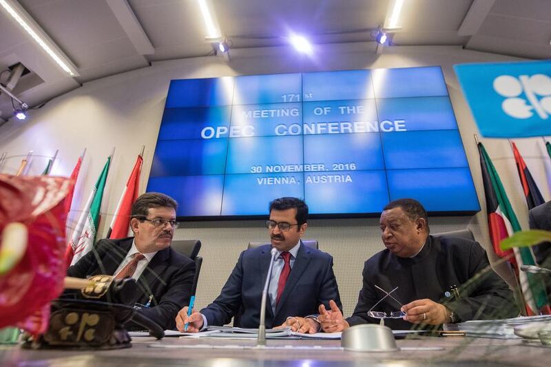 From left: Mohamed Hamel, chairman of the Opec board of governors, Mohammed bin Saleh Al Sada, Opec president and Qatar's energy minister, and Mohammad Barkindo, Opec secretary general, at the group's Vienna meeting on Wednesday. Christian Bruna / EPA