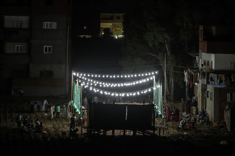 Guests gather to attend a traditional wedding celebration in the village of Shamma in Egypt's northern Nile delta province of Menoufia. AFP