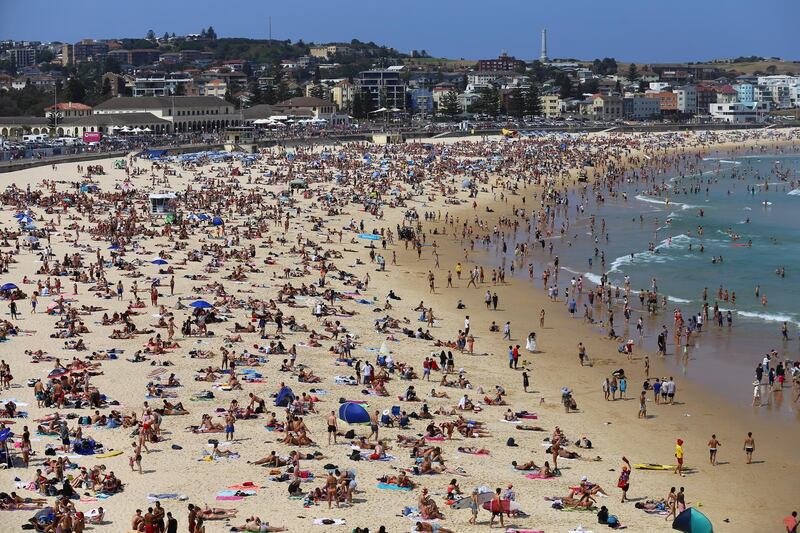 Crowds of people congregate on Bondi Beach on Christmas Day in Sydney, Australia.  EPA