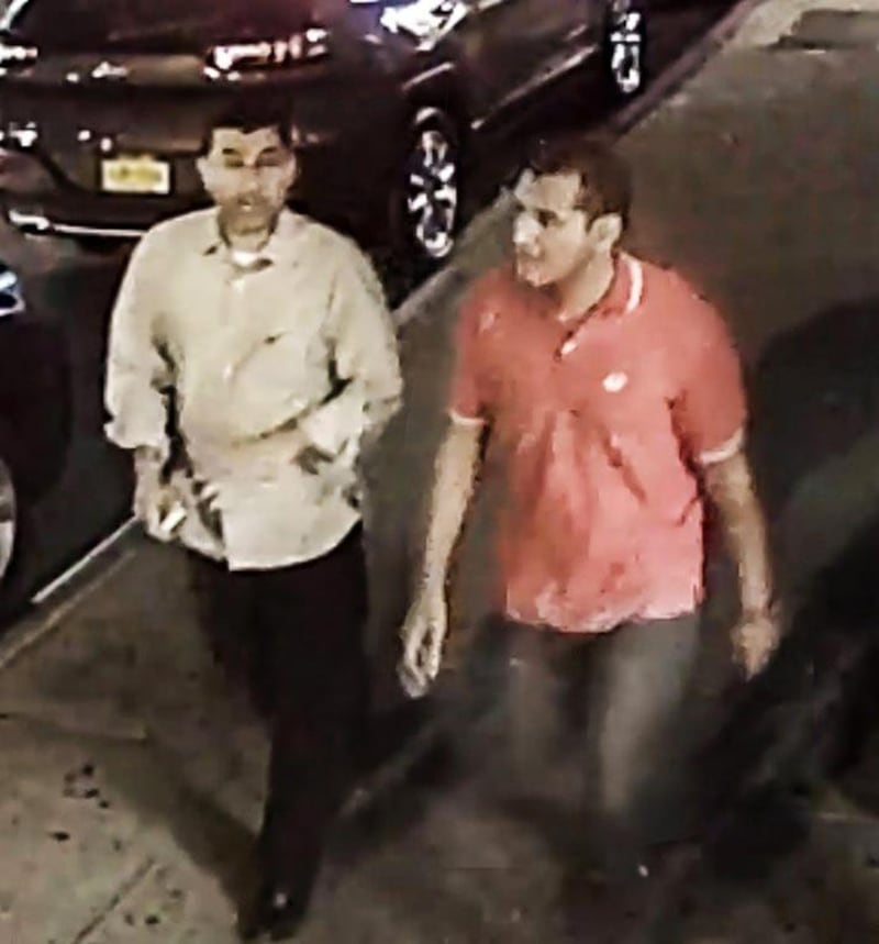 This video grab provided by the FBI shows two unidentified men walking in New York’s Chelsea district on September 17, 2016, around the time a bomb exploded on a nearby street. Investigators said the men are being sought as witnesses. FBI via AP