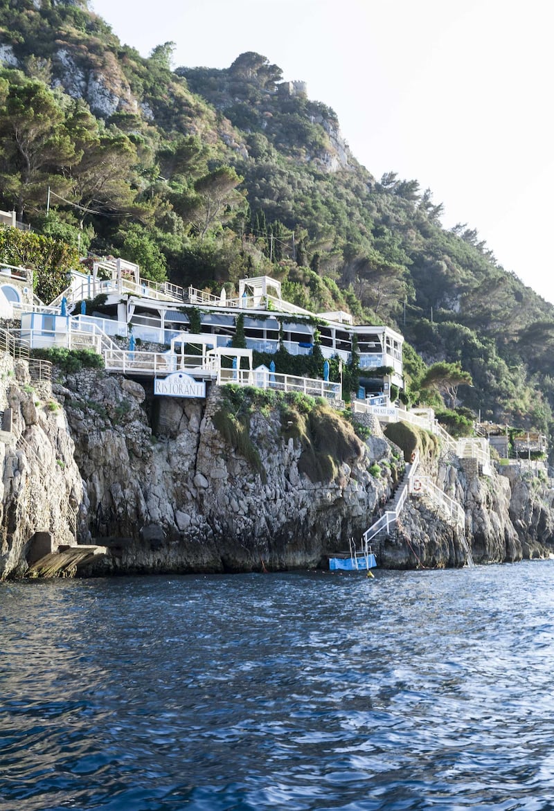 The hotel is perched on a cliff overlooking the Gulf of Naples