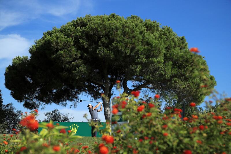 Tommy Fleetwood of England plays his shot off the 9th tee on the opening day of the Portugal Masters at Dom Pedro Victoria Golf Course in Quarteira, Portugal. Getty Images