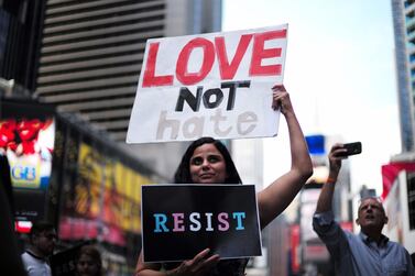 Protests against US President Donald Trump during a demonstration in 2017 in front of the US Army career center in Times Square, New York.
Trump on August 25, 2017, signed a memo effectively barring transgender people from joining the US military. Jewel Samad / AFP
