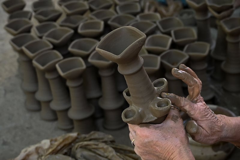 Clay lamps being prepared in Amritsar. AFP