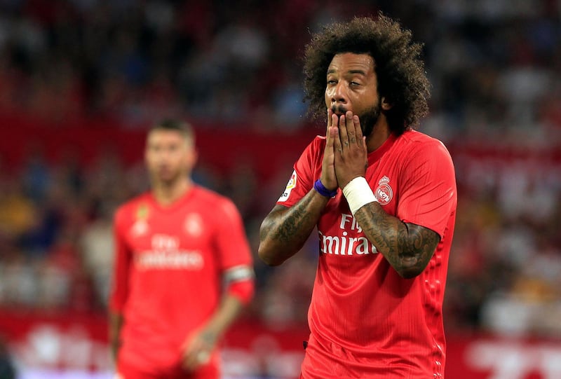 Real Madrid's Marcelo reacts at the end of the match during La Liga soccer match between Sevilla and Real Madrid at the Sanchez Pizjuan stadium, in Seville, Spain on Wednesday, Sept. 26, 2018. (AP Photo/Miguel Morenatti)