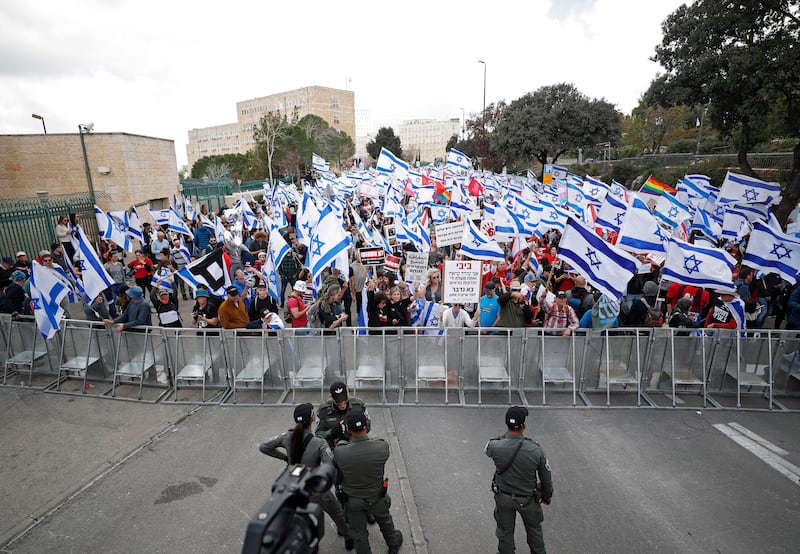 Protesters gather outside the Knesset as part of mass protests in Jerusalem. EPA