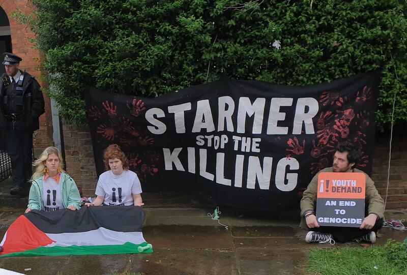 Zosia Lewis, Leonorah Ward and Daniel Formentin protesting outside the home of Labour leader Keir Starmer. Youth Demand