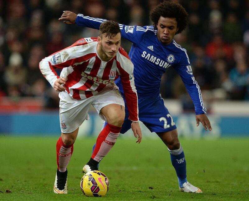 Stoke City’s Marko Arnautovic (L) in action against Chelsea’s Willian during the English Premier League soccer match between Stoke City and Chelsea at the Britannia Stadium in Stoke, Britain, 22 December 2014.  EPA/NIGEL RODDIS