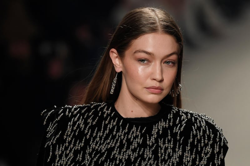 epa08253975 US model Gigi Hadid presents a creation by French designer Isabel Marant from the Fall-Winter 2020/21women's collection for Isabel Marant fashion house during the Paris Fashion Week, in Paris, France, 27 February 2020. The Fall-Winter 2020/21 women's collection runs from 24 February to 03 March 2020.  EPA-EFE/JULIEN DE ROSA
