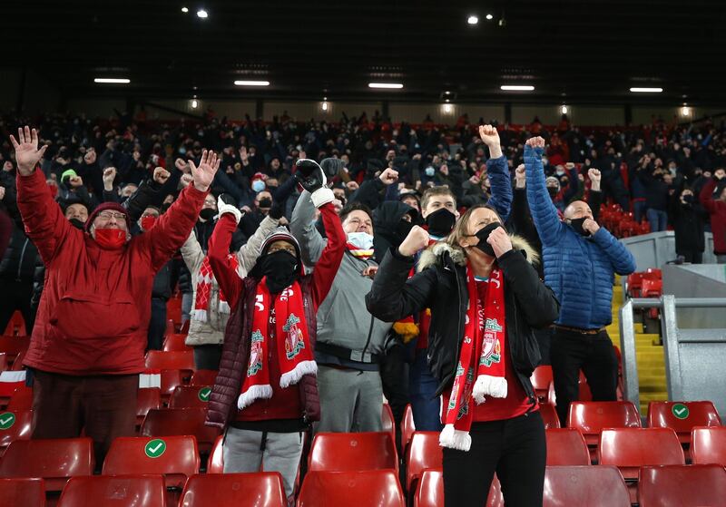 Liverpool fans celebrate. Getty