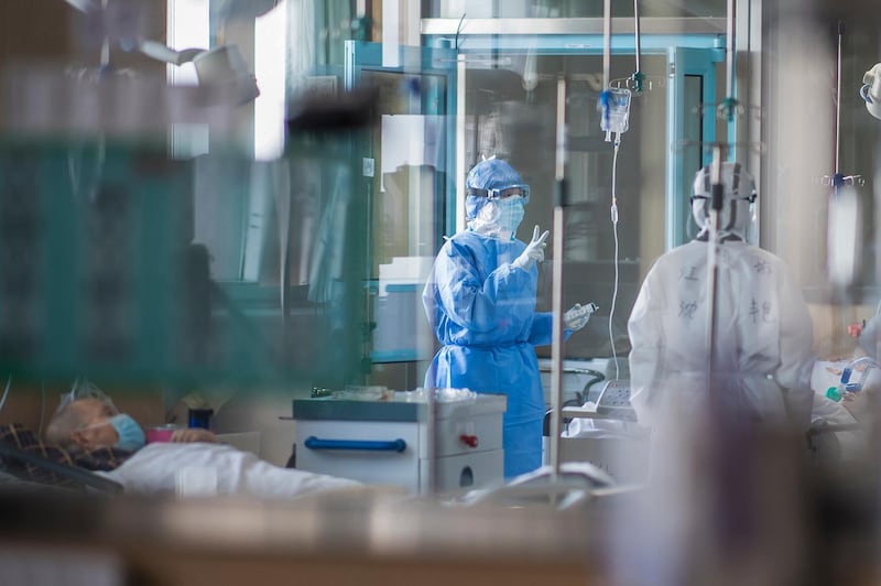 Nurses work at an ICU ward specialised for patients infected by coronavirus in Wuhan in central China's Hubei Province.  AP