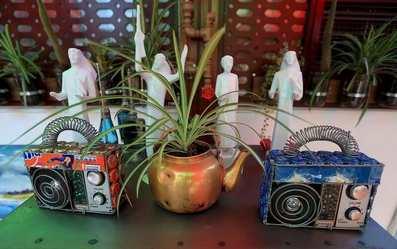 Knick-knacks made from recycled materials decorate the interior of the Art House Cafe in Abu Dhabi. Ravindranath K / The National