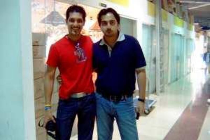 Undated handout phtograph of Saad Khan (left red t-shirt) of Karachi who died during a Unilever sponsored reality TV show in Thailand. His friend Fahd Siddiqui is on the right