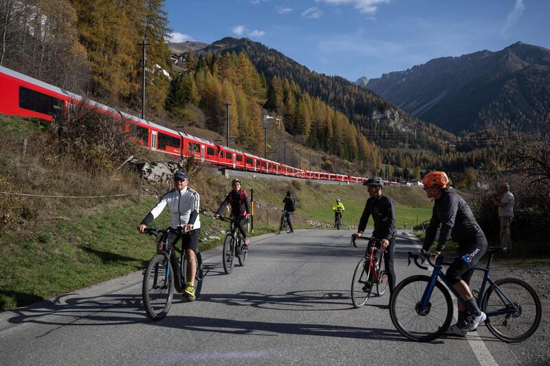 Cyclists take in the world record attempt.