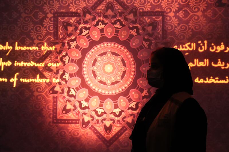 A visitor admires a stunning display in Alif, the Mobility Pavilion. Chris Whiteoak / The National