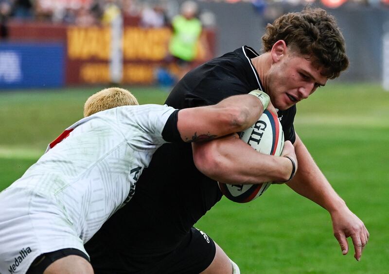 Dalton Papalii of the All Blacks is tackled. AFP