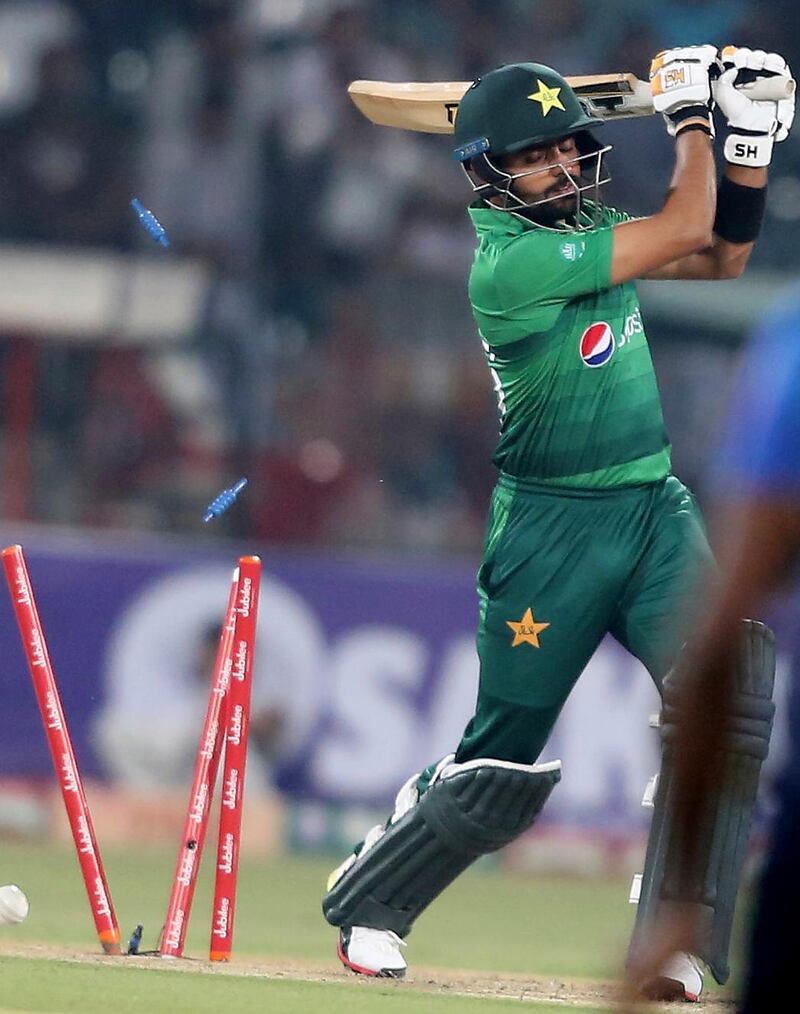 Pakistan's Babar Azam is bowled by Nuwan Pradeep on Monday. AP