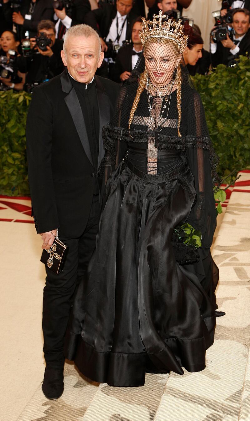 epa06718080 Madonna and Designer Jean Paul Gaultier arrive on the red carpet for the Metropolitan Museum of Art Costume Institute's benefit celebrating the opening of the exhibit 'Heavenly Bodies: Fashion and the Catholic Imagination' in New York, New York, USA, 07 May 2018. The exhibit will be on view at the Metropolitan Museum of Art's Costume Institute from 10 May to 08 October 2018.  EPA-EFE/JUSTIN LANE