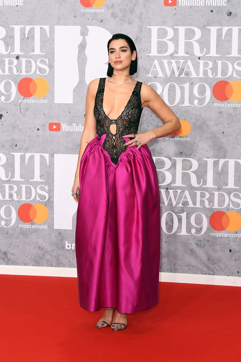 Dua Lipa, in Christopher Kane, attends the Brit Awards held at The O2 Arena on February 20, 2019 in London, England. Getty
