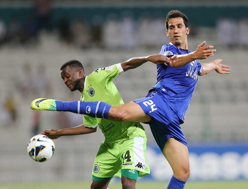  Dubai United Arab Emirates- May,15, 2013:  Al Shabab (UAE - green )  and (L)  Esteghlal (Iran - blue) in action during the AFC Championships League match at  the Al Shabab Stadium in Dubai.  ( Al Ittihad ) 
 