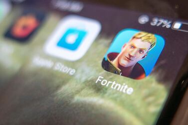 Apple and Epic Games are locked in a dispute over the distribution of income from in-app purchases of the game Fortnite. EPA
