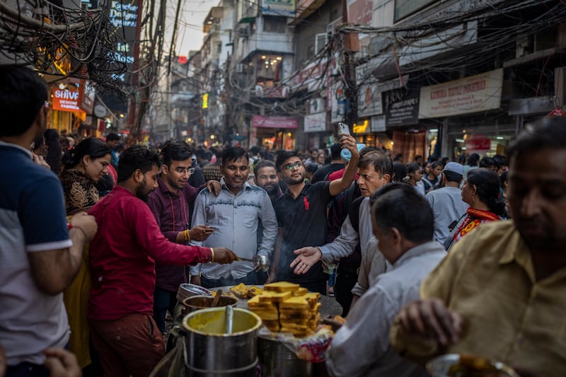 A busy market in New Delhi, India, part of an urban area where the population is estimated to be 32 million. AP