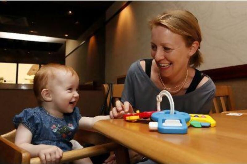 Dubai, 4th May 2011. Kristin Thrane Hart (38 year old mother from Norway) with her 11 month old daughter Liv. Kristin started a website to help pregnant women on what to do and what to expect and other matters that is important to pregnant women and mothers. (Jeffrey E Biteng / The National)