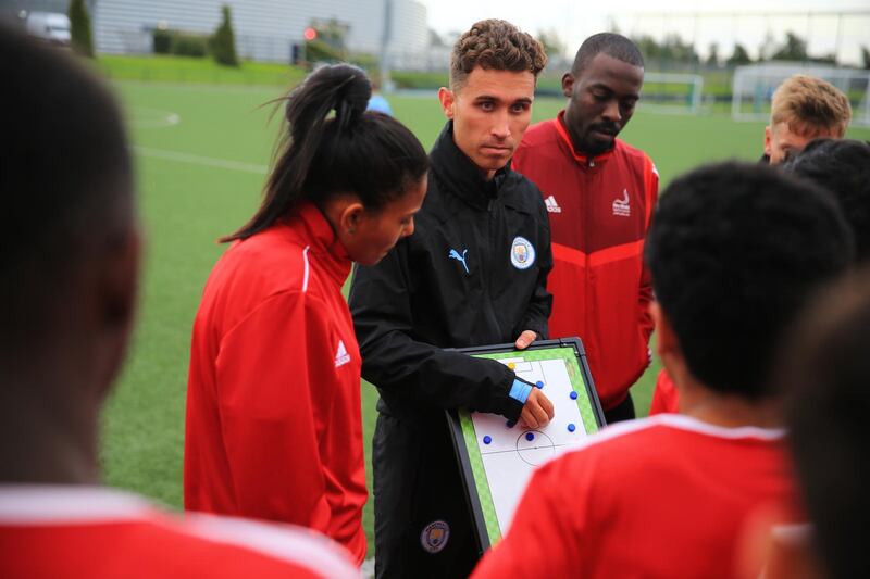 Footballers from Abu Dhabi were given expert coaching on a recent trip to Manchester City's Etihad Campus. Courtesy photo