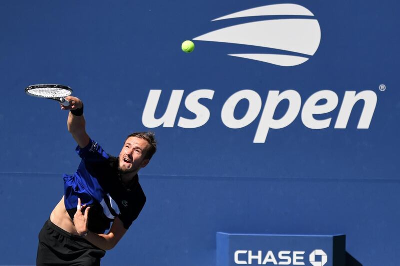 Daniil Medvedev serves to JJ Wolf during their US Open third round match. Reuters
