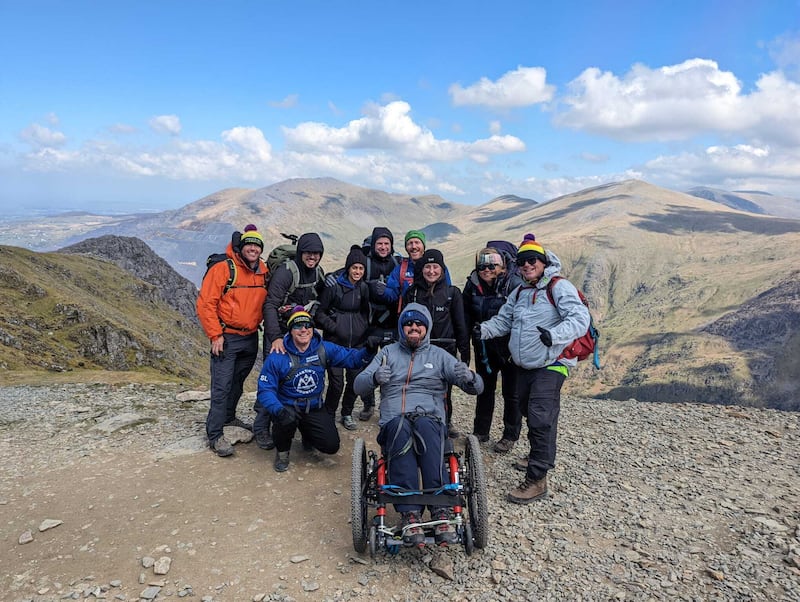 With help from his friends, Manchester Arena bombing survivor Martin Hibbert scaled Mount Kilimanjaro in Tanzania to raise money for the Spinal Injuries Association. PA