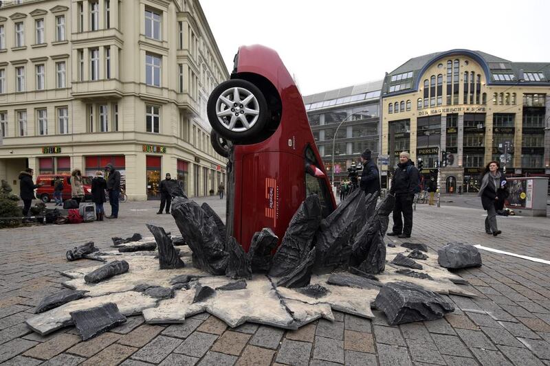 A car ‘crashed’ into the ground at Hackescher Markt in Berlin, Germany, ahead of the launch of Jeremy Clarkson, Richard Hammond and James May’s new show, The Grand Tour, on Amazon Prime Video. Clemens Bilan / Getty Images for Amazon Prime Video