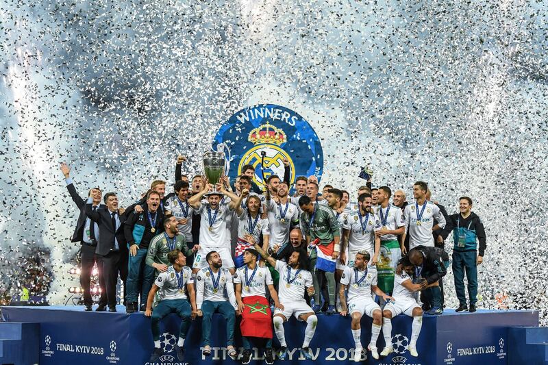 KIEV, UKRAINE - MAY 26: Real Madrid CF players ceebrates with the trophy following his side victory in the UEFA Champions League final between Real Madrid and Liverpool on May 26, 2018 in Kiev, Ukraine.  (Photo by David Ramos/Getty Images)