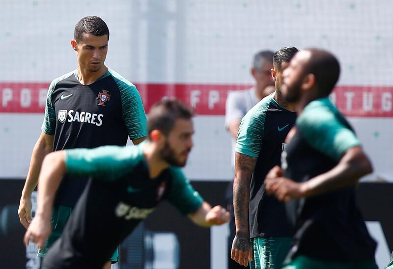 Cristiano Ronaldo and his teammates attend a training session. Axel Schmidt / Reuters