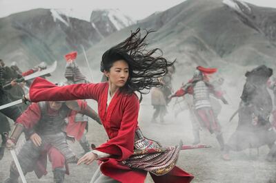 This image released by Disney shows Yifei Liu in the title role of "Mulan." The Walt Disney Co. officially postponed the theatrical release of â€œMulan," amid the coronavirus outbreak. It was was set to come out at the end of the month. For most people, the new coronavirus causes only mild or moderate symptoms. For some it can cause more severe illness. (Jasin Boland/Disney via AP)